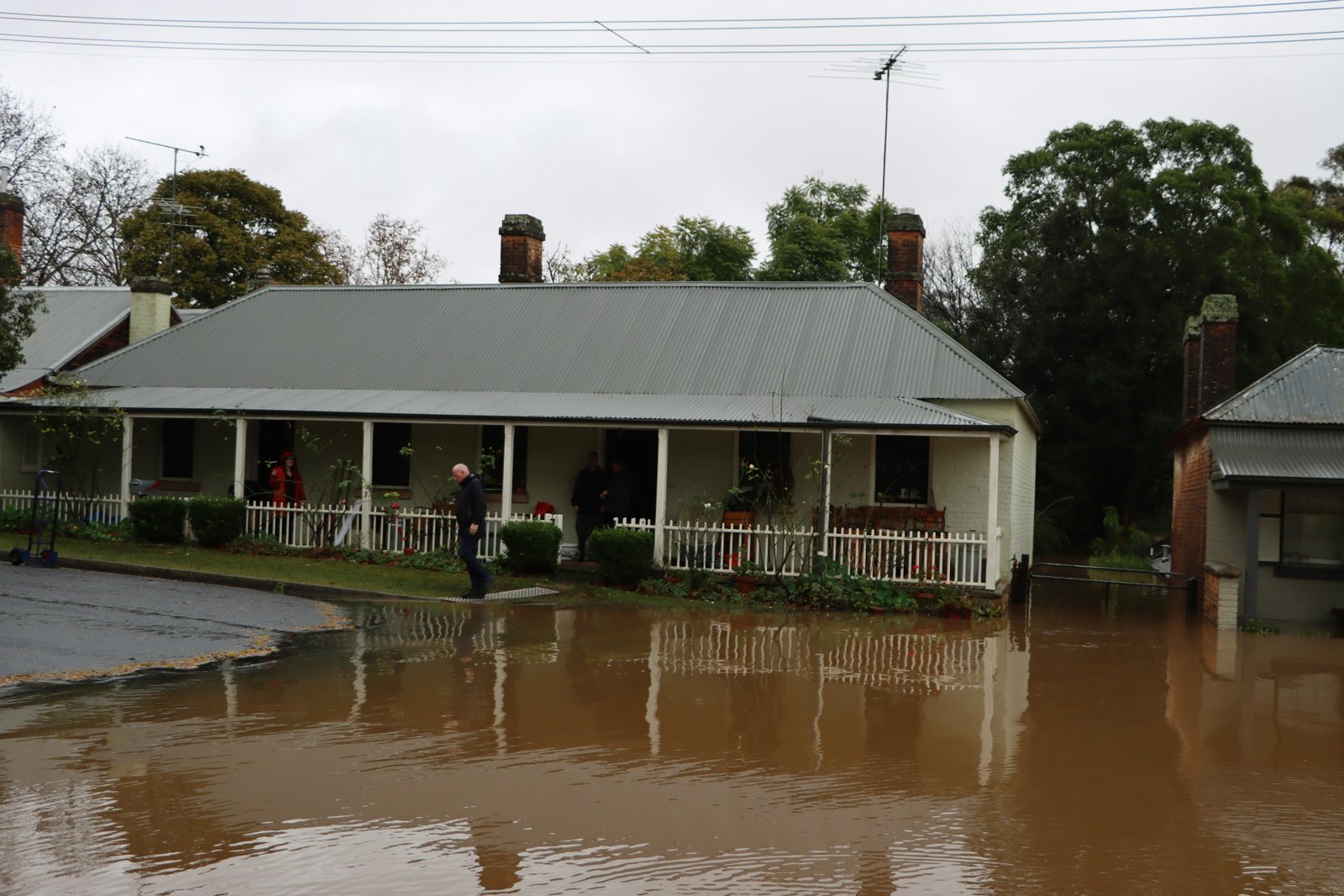 Rising flood water approaching homes