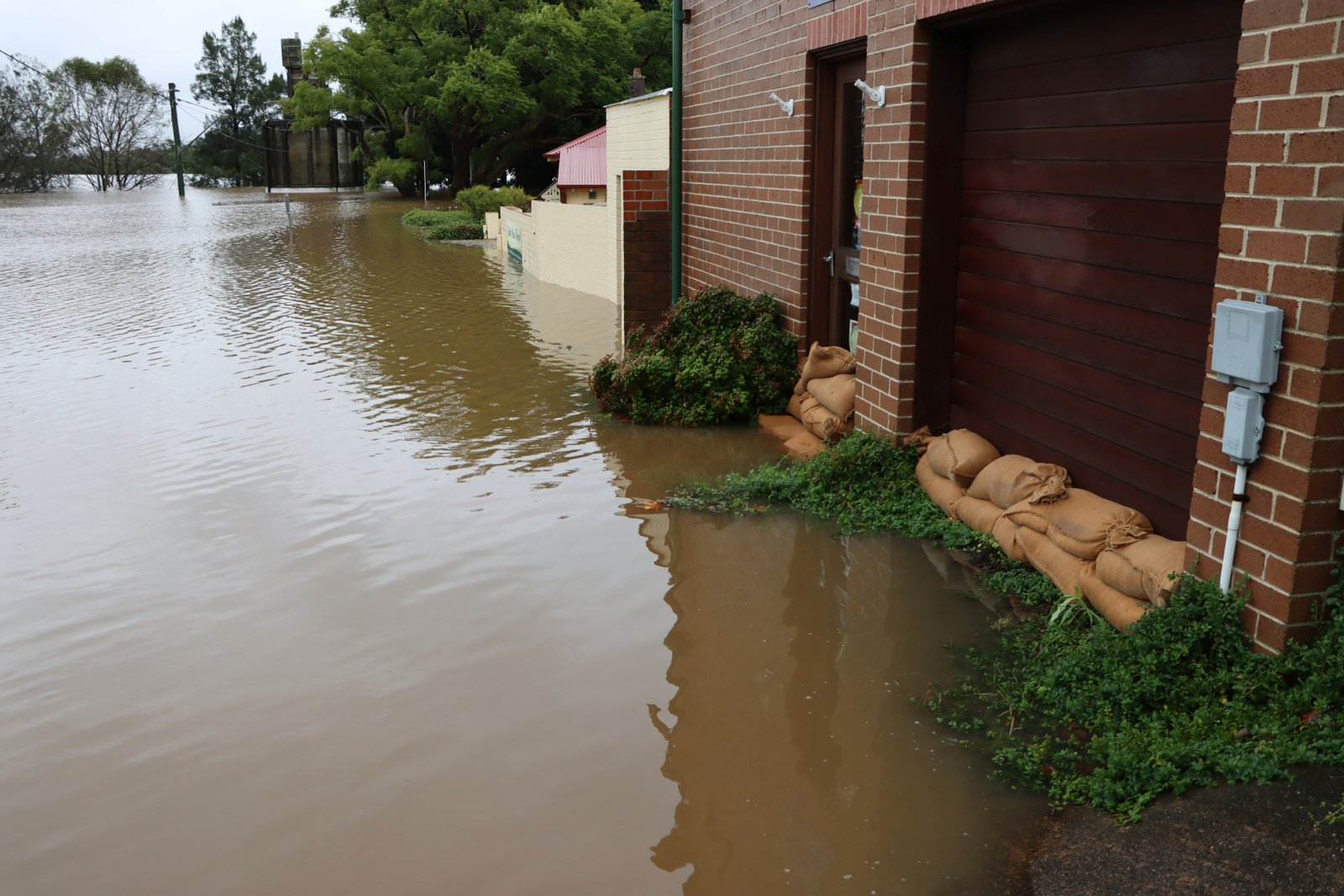 Sandbags protecting home from flood waters